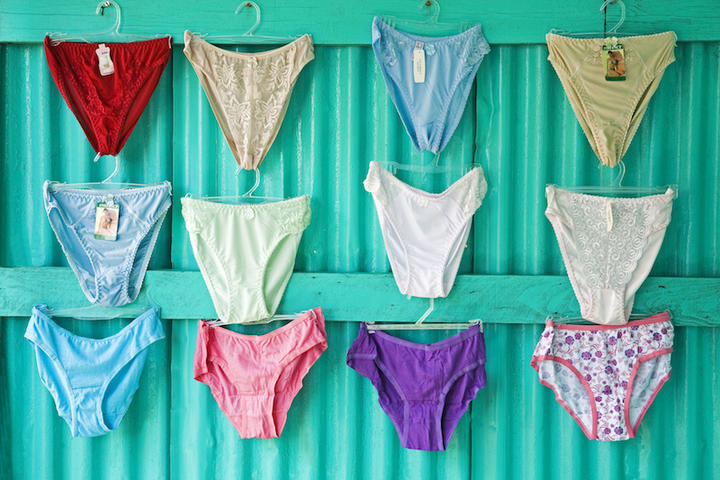 Women's underwear hanging in shop.